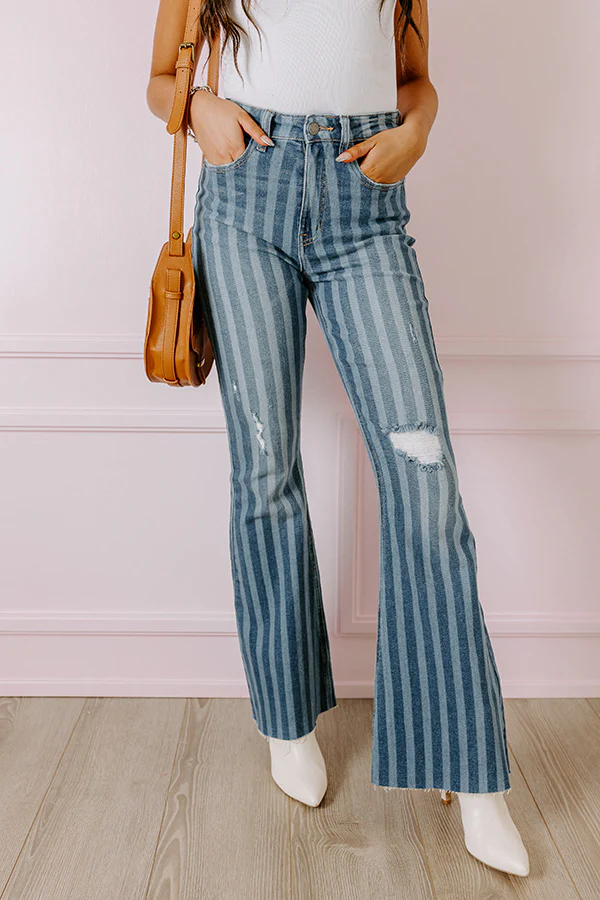 The Coston High Waist Distressed Flare in Medium Wash - Image 4